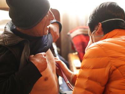 An MSF TB doctor conducts a home-base visit to a DRTB patient in Armenia. 