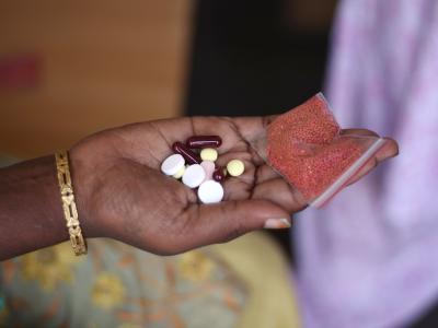 Shanti (name changed) is a 38 year old semi-literate woman living in Mumbai. She has been living with HIV and multidrug resistant tuberculosis (MDR-TB) for the past 5 years. Here, she displays her daily dosis of medication. Photograph by Bithin Das
