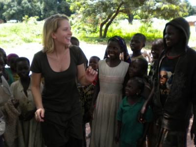 MSF nurse Kathryn Sisterman teaches children in Maitikoulou a song about sleeping sickness in their native language, Mbai.