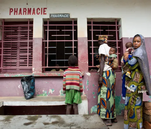 A group of mothers with their children line up to receive their drugs at a hospital pharmacy in Bossangoa, in the northwest region of the Central African Republic, June 2013.