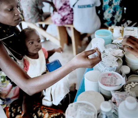 22 year old Merline receives treatment at a Medecins Sans Frontiers (MSF) clinic at a displaced persons camp in Fateb, Bangui, 2015