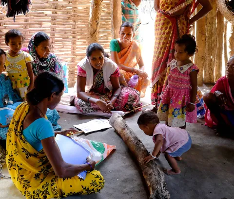 A Medecins Sans Frontieres (MSF) health promoter holds a health education information session for mothers in Aragata village, Chhattisgarh, India.