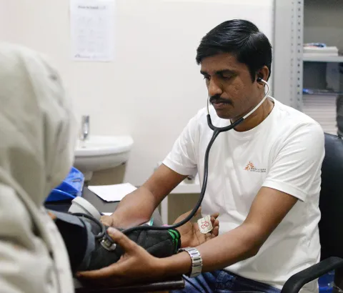 MSF Nurse Jijo Xavier checks the vitals of a patient at the PL Sharma District Hospital in Meerut city where MSF runs a Hepatitis C project in collaboration with the National Health Mission, providing free services.