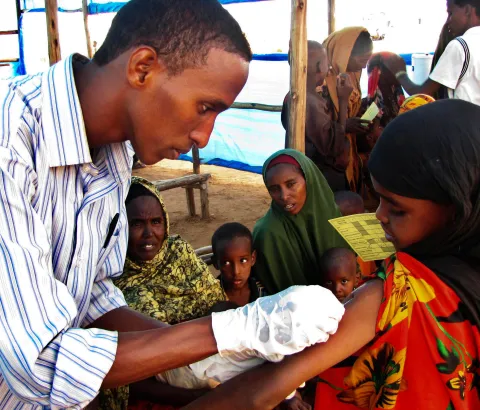 Measles vaccination. Some six hundred under-15s are vaccinated every day at the transit camp. Coupled with high levels of malnutrition, measles can be fatal.