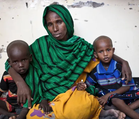 abiba Dahir Muse with her two sons Shafeer (4, left) and Abdikayr, (5, right). They came from Galgaduud region, about 160 kilometers from Galcayo. Her children were suffering from Diphtheria, two of her daughters died already. After their funeral she took the bus and brought her sons to the hospital. The transport money was collected among her community. After some days in isolation the boys are getting better and are now in the TFC (Therapeutic Feeding Centre) at the hospital MSF runs in Galcayo South. Hab