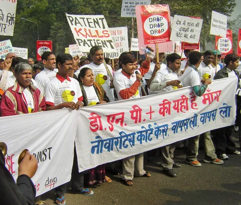 Hundreds of Indian activists protested in New Delhi on Monday against a challenge to the country's patent law by Swiss pharmaceutical giant Novartis. 