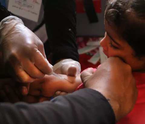 A nurse vaccinates a young Syrian girl against measles and pneumonia in Al-Atareb, Syria. MSF conducted a vaccination campaign targeting tens of thousands of children in partnership with the Syrian Immunization Group and Health Directorate of Aleppo, Syria. -Al-Atareb-14-4-2018 Roaa Hasan.