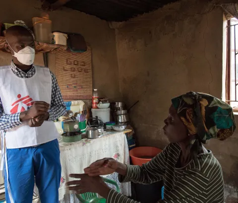 Celumusa Hlatswako, an MSF mobile counsellor, visits Winile, an XDR-TB patient, at home in Manzini Region, Swaziland. 