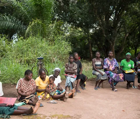 A group of ladies sit waiting for consultations, or to see the MSF medical doctors at an MSF mobile clinic site in Bodo, a village just outside Yambio, in Gbudwe State, South Sudan. Photograph by Charles Atiki Lomodong