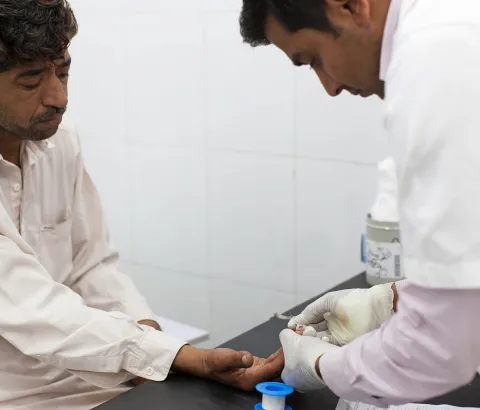 Shaukat (30) from Abidabad is in his first week of Hep C treatment and is getting tested to see how he is responding to the treatment.  “I have heart problems which makes it very difficult for me to make a decent daily wage. I couldn’t afford the medication on my own so I am happy I get it here for free. My mother-in-law has the same symptoms as me, I will bring her for a checkup.” Photograph by Sa'adia Khan