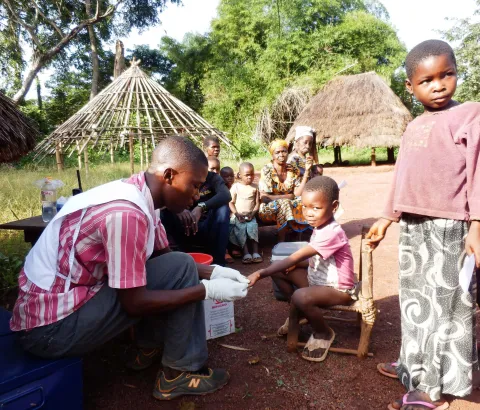 A “CATT “test, whereby a drop of blood is taken from a patient a put on a piece of paper. A reactive agent is mixed with the blood and then it is put in a rotator. The test will help determine if the patient is suffering from sleeping sickness, otherwise known as HAT. Photograph by Ilka Brodt
