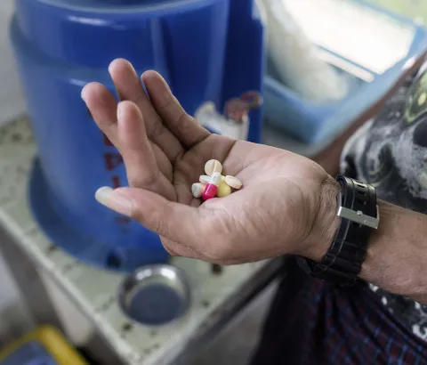 A TB patient takes his daily TB medication at MSF's Insein clinic, Yangon, Myanmar, Feb. 22, 2018.
