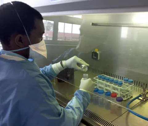 MSF lab technician working in the lab at the Nhlangano TB ward in Shiselweni, Swaziland. Photograph by Giorgos Moutafis
