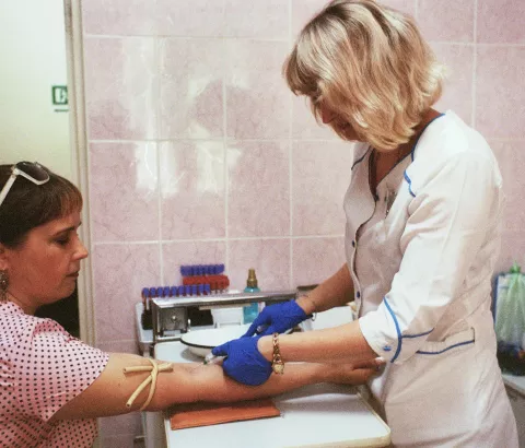 Olena Melnikova, 42-years-old, taking a viral load test in the process of hepatitis C treatment. She is one of the patients who underwent the hepatitis C treatment provided by MSF in Mykolaiv.
