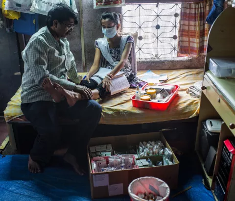 XDR-TB patient Nischaya, at home the Ambedkar Nagar area of Mumbai, with her TB medication.