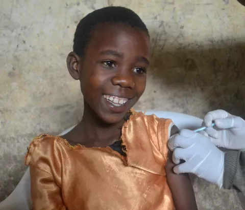 Vanessa, 9, receives her HPV vaccination at school. Chiradzulu District, Malawi.