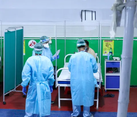 Staff checking on patients. These are usual rounds where doctors check on the progress of the patient accompanied with a counsellor to get insights into their interactions with the patient as well.