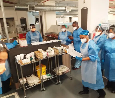 Sister Zethembiso Majola reads out thank you letters from the first COVID-19 patients to be discharged from the Livingstone Hospital basement ward, a COVID-19 ward for high acuity patients that could not have been opened without the support of MSF.