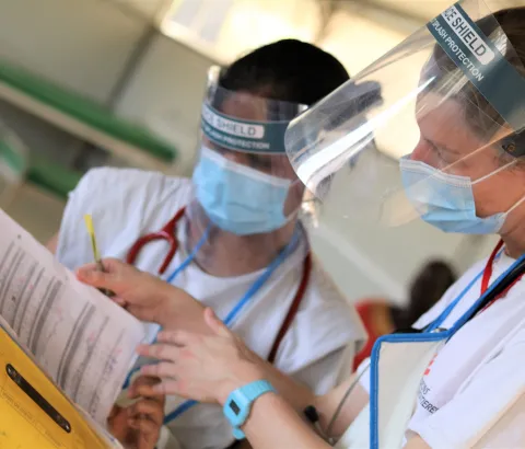 MSF’s medical staff review patient files during the ward round in the MSF Hospital in the Bentiu Protection of Civilian (PoC) site. Since the COVID-19 pandemic reached South Sudan, MSF has to reduce its inpatient bed capacity to adhere to preventive measures.