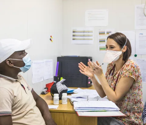 Dr Louisa Dunn, a sub-investigator on the TB Practecal clinical trial consults with a patient
