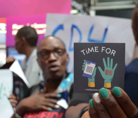 MSF protests at International AIDS Conference asking for price reduction for CAB-LA and LEN-LA.