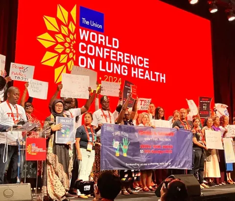 MSF and TB activists take stage at TB Union conference 2024 to call on Cepheid and Danaher to reduce the price of GeneXpert tests to US$5