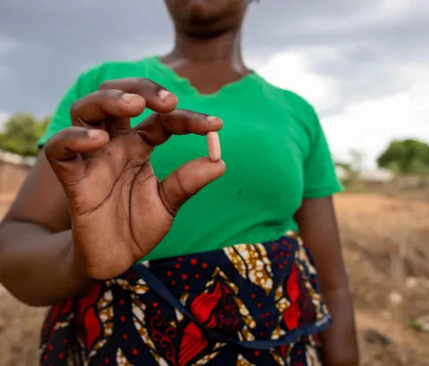 Maria Atonio, 43-years-old farmer from Macomia, shows Anti-retro-viral medication after visiting MSF’s Clinic in Nanga, Mozambique.